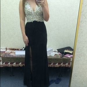 Jovani black gown with beaded top and leg slit